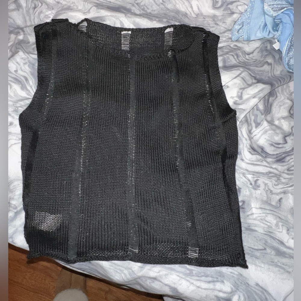 Black ripped style top never worn